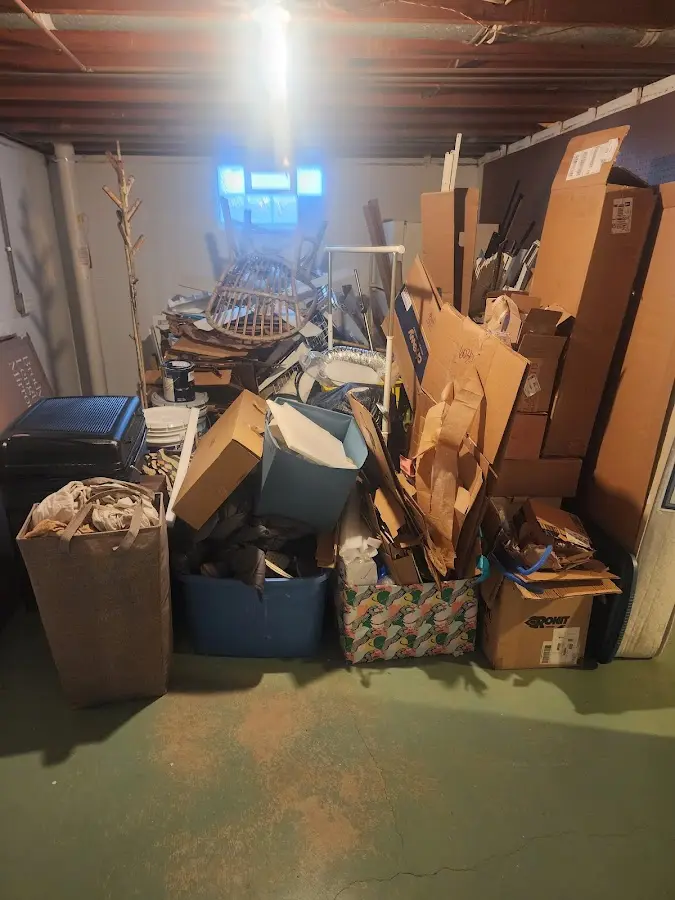 Roll-off dumpster container at job site for Yard Waste Dumpster Rental in Turner